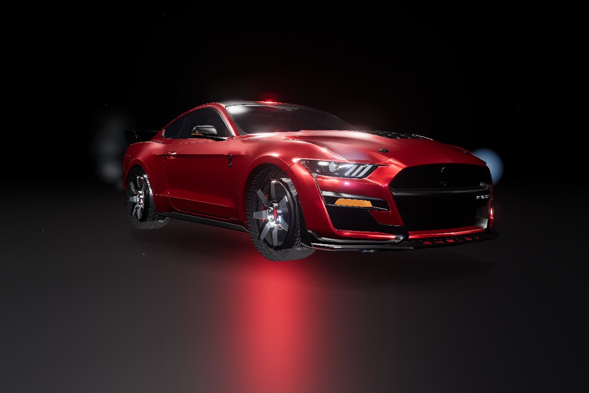 Shelby GT500 rouge de trois quarts avant, phares allumés dans l'obscurité